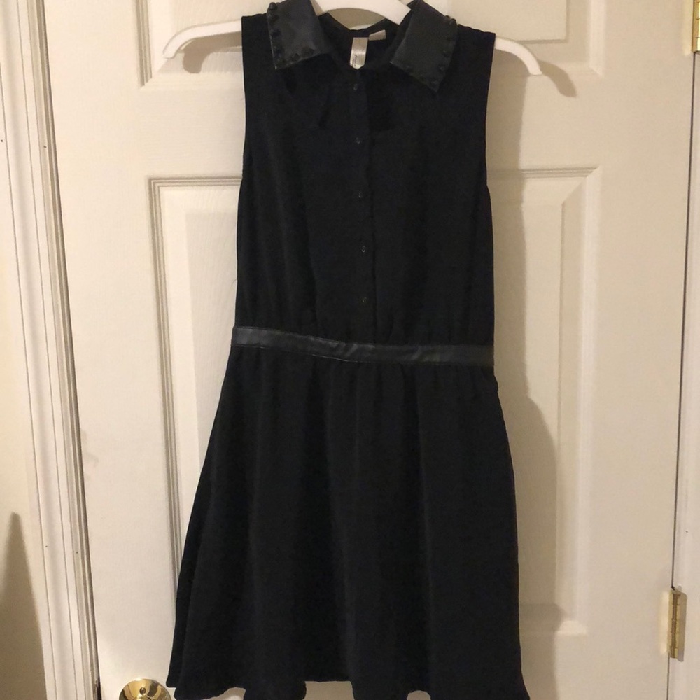 Black dress with leather collar and cutouts